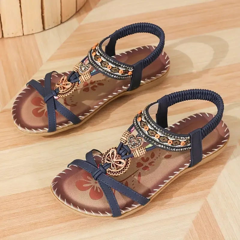 Colella | Elegant sandals decorated with flowers and a rhinestone butterfly