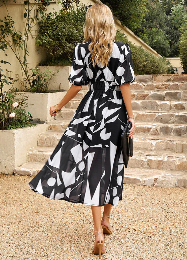 Damen Figurbetonendes Blumenkleid | Midi-Länge