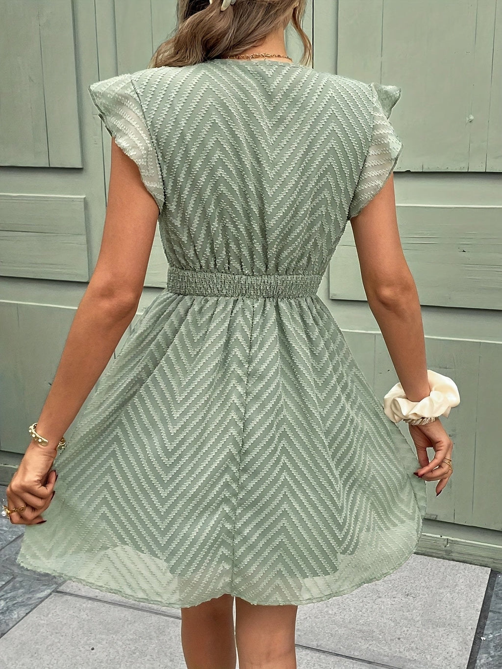 Nayora Sleeveless V-Neck Dress